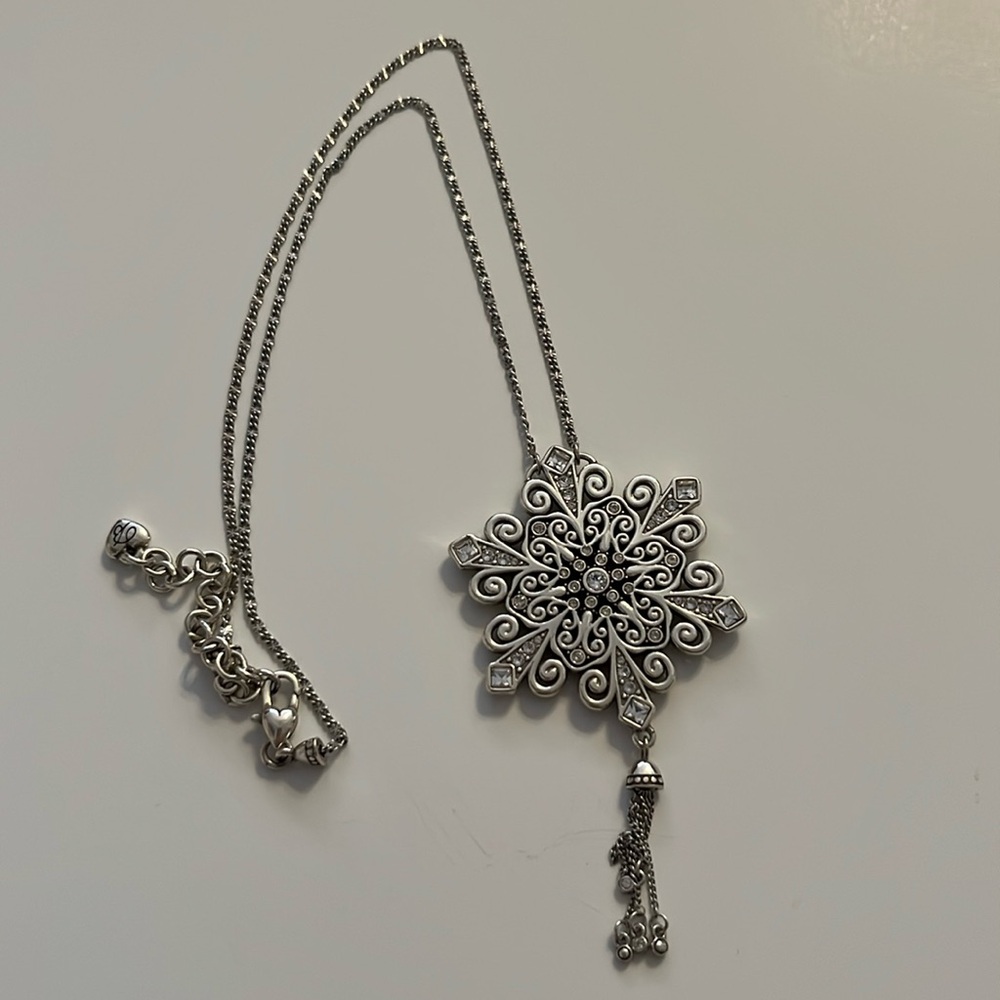 Brighton All That Sparkles necklace. Reversible snowflake design. Silver plate.
